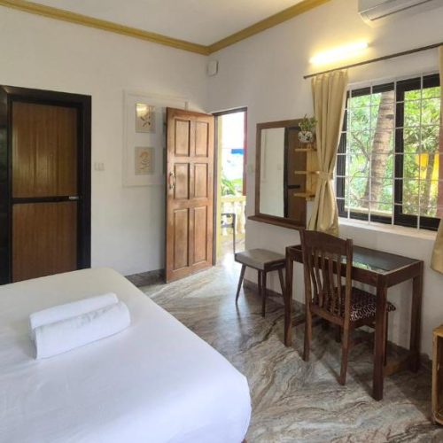 Mini fridge and electric kettle in room at Laligurasvilla, Candolim