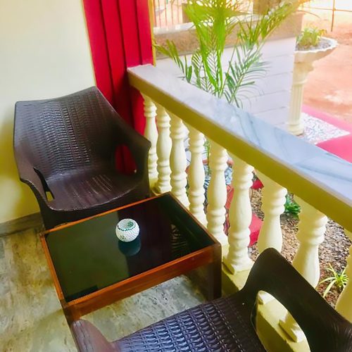 Sunny view outside hotel room balcony in Candolim Goa